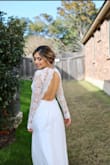 I loved this dress and everyone at my bridal shower thought it could very well be my wedding dress! I'm very happy with this purchase. I wish I would have gotten an XS. I'm not very busty so I didn't fill out the top. I even had to take the hem up by about 4 inches (and I was even wearing a 3 inch heel!) Which cost me about $75 at the tailor since it has three skirts. Aside from that, I LOVED this dress! - Venus M.