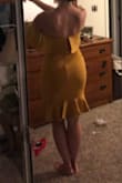 I can't believe how thick and forgiving the material is on the dress. It holds you in and is so super comfortable. I haven't worn it to the wedding yet- but I am anxious to! The color is bright and beautiful( hard to tell in the photo -poor lighting. =,) - Carrie J.