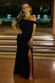 Very flattering. I got it hemmed about half an inch and it was literally perfect. I received so many compliments. - Andrea G.