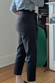 Love these pants, the waist is definitely the right size but the thigh and butt area do loosen up with wears. I almost wish I had a M waist size with a S pant leg. Considering getting these tailored for a closer fit, but for now a quick wash helps tighten them up a bit. Photos included shown after about 3 wears. Great pants for wearing all day, I never feel uncomfortable in the way that some high waisted pants make me. Very cute! A little overpriced for the actual quality and being 100% polyester, but if purchased at a discount they are worth it. - Sarah B.
