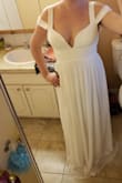 I bought this as a contender for my vow renewal. I ended up going with a different dress from Lulus, but this one is stunning none the less. A huge pro of this dress is that it has good support for the girls, but the waist has no stretch. - Maria W.
