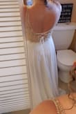 I had to wait a month for my size to come back in stock. I bought this for my vow renewal next year and I love it The slit comes to the perfect spot and the lining makes this dress incredibly comfortable. The lace up back makes the fit perfect as I have a short torso and thicker waist. - Maria W.