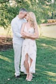 This dress is beautiful and easy to wear.  The slit is high but has a built-in slip. I wore it for my engagement photos and then a few times after to parties/celebrations.  It's my favorite dress. - Cheryl S.