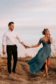 The dress looked exactly as I had pictured.  The material is pretty heavy and pulls the top down a bit.  I did have to hemm the front a couple of inches but overall it was exactly what I was looking for. I would buy it again if I had to do it over. :) - Jaci R.