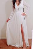 This is a really beautiful dress! I love the sleeves cutout details and the flowy bottom. The dress is very well made and of great quality. Very comfortable to wear it. This was a strong contestant as my elopement dress but I decided to go with another Lulus dress that was more my style. Hard choice! Highly recommend this dress! - Tassia D.