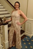 Wore this dress for a Valentine's Day Soiree. I was trying to find a dress that wasn't the typical pink or red but something that was still romantic and Valentine's day theme. I had to order a size up but I am also pregnant and was just over 19 weeks pregnant in the picture. I figured this would be great to wear again and I can get it altered if need be. I got lots of compliments on this dress! I was told a million times that I looked like a goddess. Loved it!! - Andrianna G.