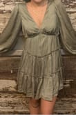 I got this dress for recruitment and I absolutely love it. The small was slightly looser but I wouldn't change the sizing and it made it super comfy. I ended up wearing it all day (why it looks wrinkly in the pic) and I didn't have any problems. - Nina T.