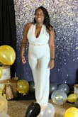 I love this jumpsuit! It fit so comfortably and looks so pretty. The fabric is thick so it's not see-through, but not hot. The length was perfect for my height; not too long. Do be cognizant of the underwear you wear though! - Lauren F.