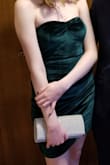 Ordered this for my daughter for a school dance. Arrived within the shipping window expected, good quality, and fit true to size. Dress was lined properly, which we found is rare for some online sites. We modified the neckline a little with an easy stitch. The stay-up strip inside was not effected and she had no issues with the dress slipping down, even when dancing. She was very happy with it and will wear it again. - Nicole M.