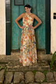 Purchased this dress, in size M, to attend a beach wedding overseas.
I absolutely loved this dress the moment I saw it on the website, and I was happy that it looked great in person as well.
I got so many compliments on the beautiful print!
The dress was a bit loose on the waist, but I decided not to take it in. It was also a bit too long even with heels on, so I got it hemmed.
It might run a little larger than I expected, but I am sure that the size S would have been too tight, since I have a curvier body. - Jana P.
