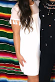 Love this dress but size up if you have a big butt and thicker thighs! Got a medium and it was perfect. - Gabriella S.