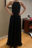 With the adjustable straps the dress fits perfectly! It's comfortable and light but has just enough weight that it drapes beautifully! - Breshelle P.