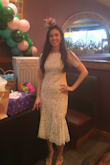 Purchased this dress for my fiesta bridal shower. I ordered an extra small and it was too tight. I exchanged for a small and it was just right! The length was perfect, the style is perfect. - Joelle H.