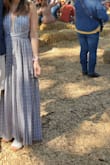 I love this dress! Wear it with wedge heels to dress it up or flats to dress down. The halter tie is long enough to do all sorts of styles with it but I usually just tie is classic behind my neck. I get compliments every time I wear it. - Britni C.