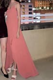 this dress was perfect and such a dream. the wrap mechanism was much more sophisticated than i expected and i was able to wrap it around my waist very tightly. the material is great. color is gorgeous and is not at all muted in photos. the only thing i'd change is the length - i am 5/3 and even with 4'' heels i had to get about 5 inches cut off the bottom! other than the length, everything else was perfect. highly recommend - you will get lots of compliments :) - Francia