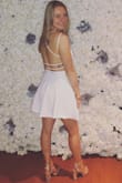 I looooved this dress and how confident I felt in it! The material was amazing and I always worry wearing white it will be see through but the material was thick! I have never felt more confident in a dress than I did when I wore this! - Monica F.