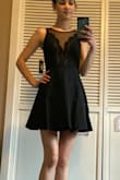 I fell in love with this dress and couldn't wait for it to arrive! I have a small bust, so I was concerned the mesh top might fit a little loose, but after reading every review and seeing every picture uploaded I decided to chance it. The fit of the dress is actually perfect and the skater bottom is very twirly. I love the low cut back and the mesh top is a good fit, but there was an issue I wasn't expecting. The lace detail on the front top does not match up at all and it's super distracting. It looks so strange on I don't think I can ever wear it. Very sad. I relooked at every review and picture and don't see this mentioned at all! Maybe I got a flop, I wish I could exchange it for one that is better matched and sewn but it was final sale. I'll have to keep that in mind when I order in the future. - Darcie R.