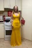 I absolutely love this dress! The colour is super vibrant and exactly like the picture, the lining is amazing and it fits really well. I'm from Australia and it arrived within 2 weeks which was amazing! I ordered it for my school formal and I am so happy with it!

I knew from all the reviews that it was going to be too long, however with some big heels it barely skimmed the ground (In the photos I am wearing 4 inch heels- they were taken before I got the dress hemmed) If you are short like me, I would definitely recommend getting this dress only if you have someone available to hem it and bring the straps in. 

Also, this dress pretty much shows every lump and bump. It looks gorgeous but I would strongly recommend wearing shapewear underneath it to ensure you don't see any underwear lines. (First picture= no shapewear, second picture=shapewear and a better bra) - Linda S.