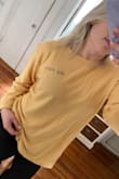 Love this top! Ordered A medium for a loose fit to wear with leggings, etc. Very soft and cute color! - Lindsey T.