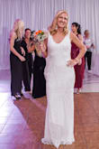 I wore this dress for my wedding reception dress. I received so many compliments. The material is absolutely beautiful!! - Holly T.