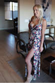 Gorgeous dress, flowy and sexy. Very happy with dress.  The top button could use some reinforcement. Very beautiful colors and floral pattern . - Marina S.