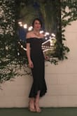I loved this dress. I felt like a movie star. It's elegant, sexy, versatile, and very comfortable.

I have narrower hips so I did have to get the dress altered in the hips and slightly at the waist. - Nicole J.