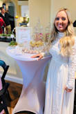 I got so many compliments in this dress for my bridal shower. Everyone kept saying that it could have been my  me that it could have been my wedding gown. It fit perfectly and makes your was it look super slim. You'll probably have to get it altered if you're around my height as it's a little long but totally worth it! I'd recommend this dress 1000%. - Logan J.