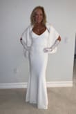 I absolutely loved this dress! I received so many compliments on it. It runs a little large as the other reviewer said. I purchased the small and was very happy I did. I was a little bit nervous about getting a small since it is in white and I usually like to go larger with lighter colors but it was absolutely perfect. - Lisa H.