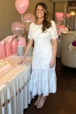 I wore this dress for my bridal shower in February, it was absolutely perfect! I wore a medium and it hugged my curves perfectly. I received compliments all day from everyone. The only issue was the dress got loose by the end of the day but most dresses tend to do that. Loved it ! Highly recommend! - Nicole G.