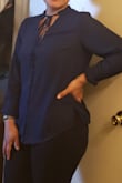 I love this shirt , nice color  a bit loose, but i could work with that,casual you can wear with jeans ,skirts or tights. - Kenia P.