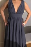 I bought this dress for a wedding, and I think it's beautiful. Needed to make a few tweaks to the dress though. The length is really long so had to get that hemmed, and the top is very loose so fashion tape is a must! The fabric is a little heavy but overall happy with the dress. - Grace L.