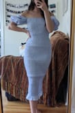 It scrunches up in the areas that are curvy and becomes more obvious with less than perfect posture and it is even more bulges in the back. It's a lovely dress otherwise! - Dimika N.