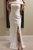 I loved this dress! I read all the reviews and checked the size chart and decided to order the small. Well, it's too big in the shoulders for me and still some room in the tummy area which I was a bit worried about. I'm going to try the XS instead. - Kirstina H.