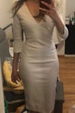I love this dress, it's classy, elegant, and I can't wait to wear it to my engagement party! The thick material feels very high quality. The shape is nice. Minus 1 star because as I keep discovering with Lulus, the size chart don't really match the dresses that well. Got an XS and the shoulders are too large, and the length too long, but this was fixed with alterations. I felt like it was worth altering because I couldn't find a dress like this one and I wanted something form fitting, and personally having extra fabric at the shoulders bothers me. I'm definitely a pear and much bigger at my hips, and this dress had enough stretch to both fit my hips and accentuate my waist, something that's hard to find! - Sabrina B.
