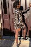 I felt like a crystal ball!! This dress is super cute. I ordered a medium and large and kept the large. While I typically wear a medium, this particular style (short, minidress) was best in a large - Nia T.