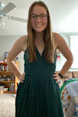 This dress really is beautiful and lovely. I got it for my college graduation and plan to also wear it to weddings and Christmas parties. The V-neck is deeper than I would prefer, especially if you have big boobs they will be out for people to see. I used a pin to raise up the V-neck so it still looks nice but isn't so revealing. I also like how it's longer past the knees, feel like most dresses are way to short! Overall, love the dress and would recommend. - Sammy R.