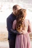 This dress is beautiful. You definitely need a sticky bra or the like I'd you're busty under it, and the arms were pretty big on me, but not so big to look awkward. Wore to a wedding and for my engagement photos and got tons of compliments! - Shelby N.