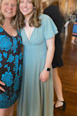 The dress fit perfectly everywhere, but was long and I had to get it altered. The dress shows quite a bit of bust, especially sitting down. Besides this I absolutely love the dress. The material is nice and the color is lovely. Heads up, if you're a short girl expect to drop some money on alterations. - Claire N.
