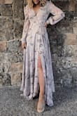 This dress is GORGEOUS! Such a beauty. The dress was a tad "larger" than expected.Very long on me even with wedges on. But overall would recommend! - Stephanie S.