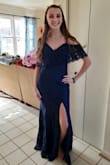 I absolutely love this dress and it's elegance. It is very lacy, which is what I wanted, and the "off-the-shoulder" look is sometimes hard to find, but this was exactly what I was looking for, and within my price range. It's slightly large in the bust area for me, but it's not very significant. I wouldn't exchange it for a smaller size just because of that. - Caroline P.
