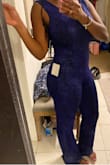 Very nice jumpsuit! Very stretchy! It's a bit long! For my 5'5 frame, definitely need at least 2-3 inch heels. Material is nice! Definitely for the nightlife. - Sofia A.