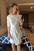 I LOVE this dress! I wore it for my bridal shower and received so many compliments. The material is very quality and there is a great white lining so it's not too see through. I wore nude underneath and it was fine. - Tara B.