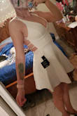Super cute! All time favorite dress. I definitely will be purchasing different colors.
Overall the dress is very tricky to get into!! Go slow!
This is a small. 2 things I dont like: 1) it is so short. I mean short. The under skirt does not go past by butt -- nothing nude spandex cant fix.
2) the lower back straps dig into my back a little. Not enough to hurt, but enough to make be think my lover handles are being highlighted. I got a medium too, but the medium doesnt cup my boobs and make them perfect like the small does, and the top straps were too loose than I'd like.
Regardless over all amazing.
Medium: still short, like the small. The lower straps were great, upper too loose than I'd like.
Small: cupped my curves nicely. I can work around. - Krista R.