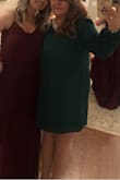 After steaming the deep wrinkles and creasing out of the fabric from the way it is packaged, 
the dress looked great. With dressy shoes and jewelry it looked more expensive than the price tag. I got many compliments on the color. I ordered XL. - Kim H.