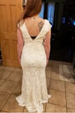The quality is amazing of the dress! The shoulder area is a little big but I am like that in all dresses. The length was perfect! The picture I have no shoes on so with heels it will be great! - Chloe M.