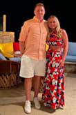 I wore this two-piece on our recent trip to Cabo San Lucas, and I felt amazing in it. I received so many compliments when I wore it and on the pictures afterward. The orange and blue colors are beautiful. I sized up after reading some of the reviews but would have been better with my normal size. Regardless of size, I think most people would have to take up the hem. I'm 5'4 and needed to have 8 inches taken off the bottom. - Melissa M.