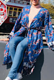 This robe is really, really pretty. It isn't cheaply made and the colors are vibrant. I'm usually a medium but I ordered a large because I knew I might be layering underneath and I wanted to make sure the sleeve length was long enough. You can dress it up or down, but either way it will look great. - Kristen C.