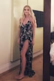 The material on this is very light, which makes it great for hot weather destinations.  It does run very long and I'm a fairly tall girl, I also find that the top fits a bit loose even after being tightened as much as comfortably possible with the strings.  But overall cute print and easy to throw on after a long day at the beach where you want to feel like your not wearing much. - Rebecca P.