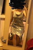 Achieves a nice silvery-gold look with a sage tint. Ends mid-calf at the back and just over the knee at the front. Ideally I'd prefer it to be ever so slightly tighter around the legs but I guess this dress is supposed to fall more naturally past the torso. Comfortable, and adjustable straps are extremely helpful! - Kaitlyn W.