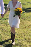 I was skeptical about getting a dress online, but there were tons of good reviews and pictures! Plus we up and decided to finally get married in just a week! While it still being fairly cold, so there were no dresses in stores. And couldn't beat the price! It's very beautiful and looks just like the pictures! I love it! - Britta F.